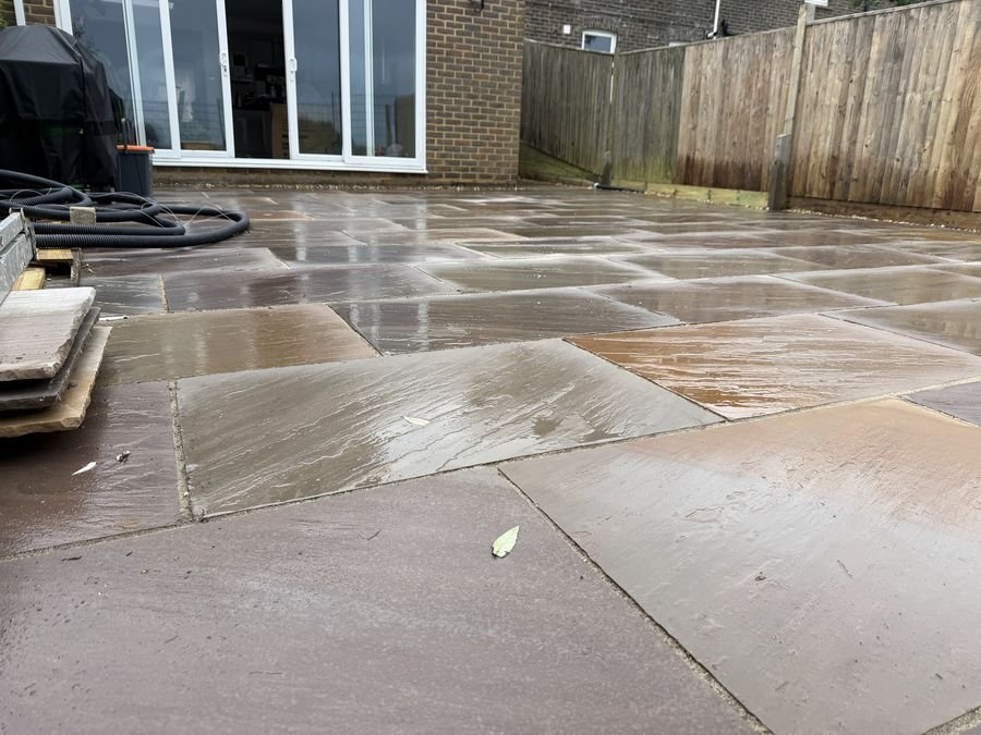 Large patio installed to fall away from the house
