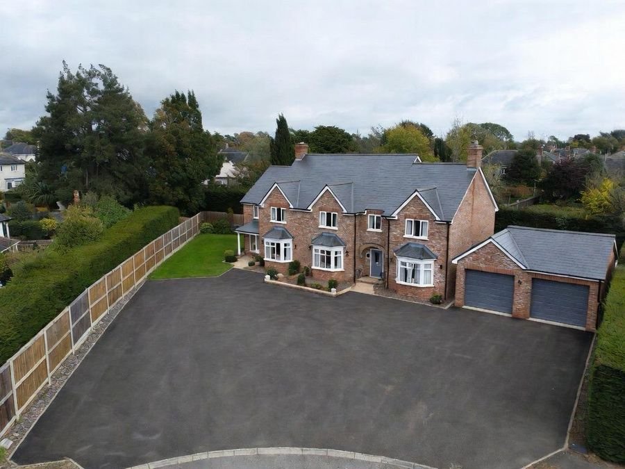 Large tarmac driveway and parking area, from the air