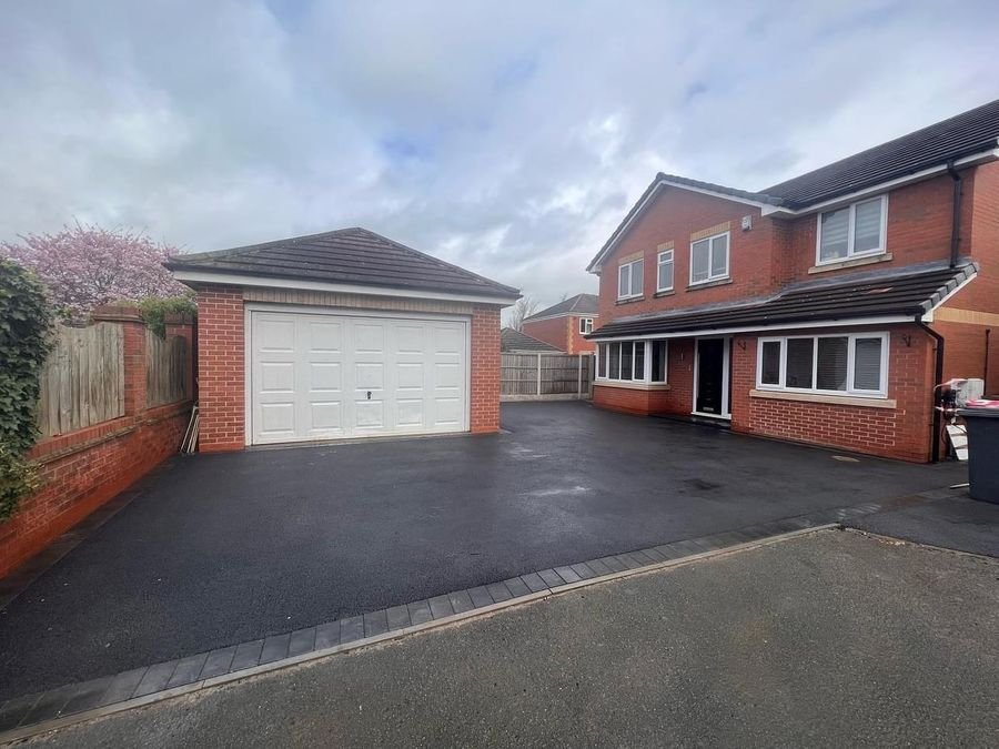 Tarmac driveway and garage approach